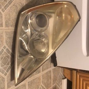 Headlight for Kia Sedona.